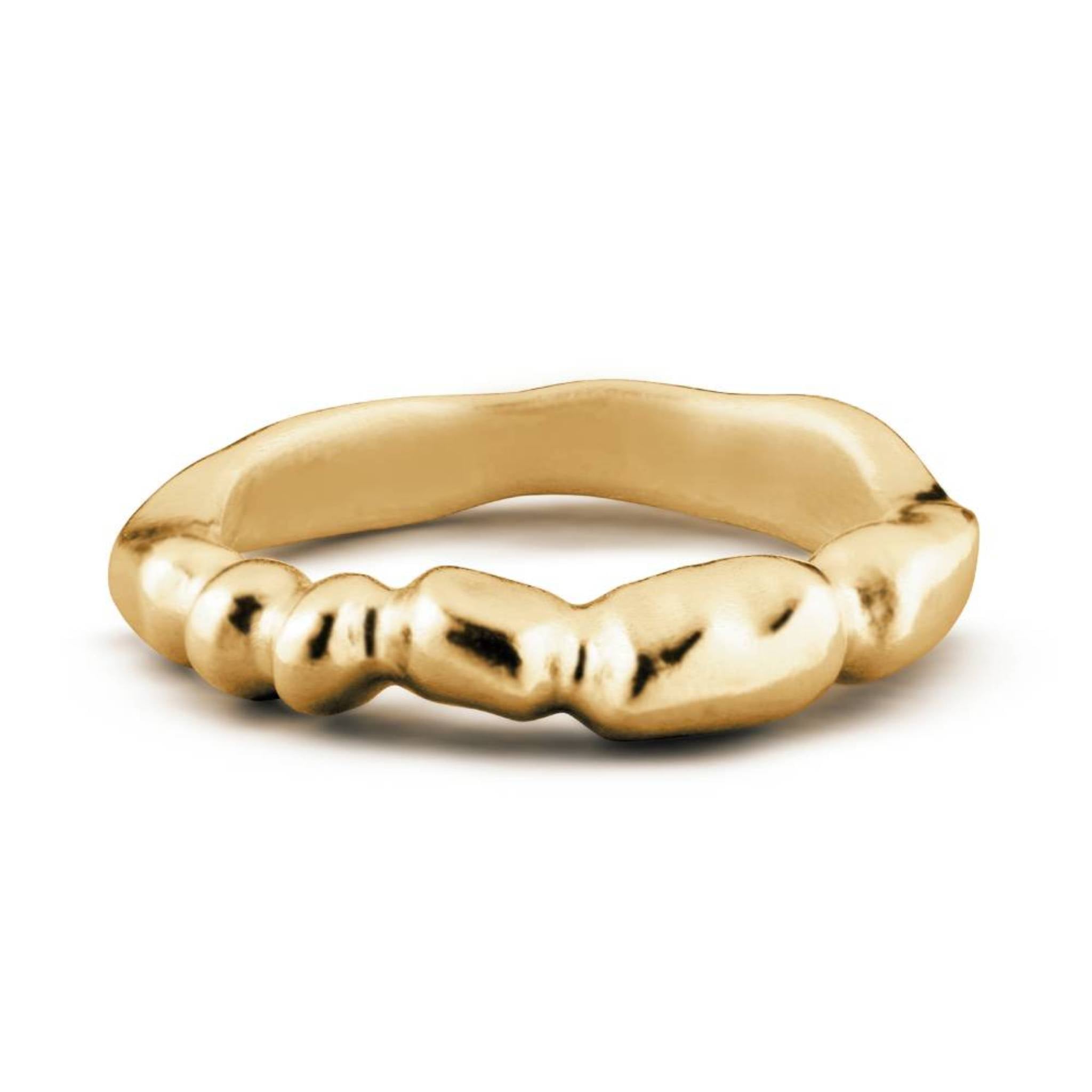 Aimless A 18ct gold vermeil sculptural stacking ring close up on white background