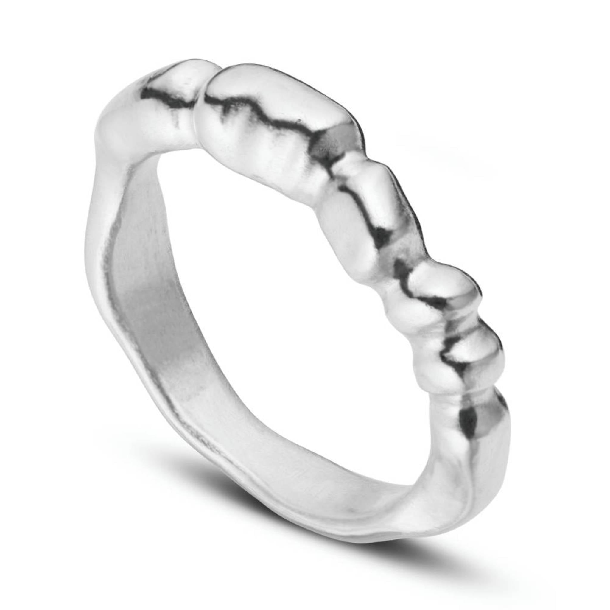 Aimless A recycled sterling silver stacking ring angled view showing irregular band design