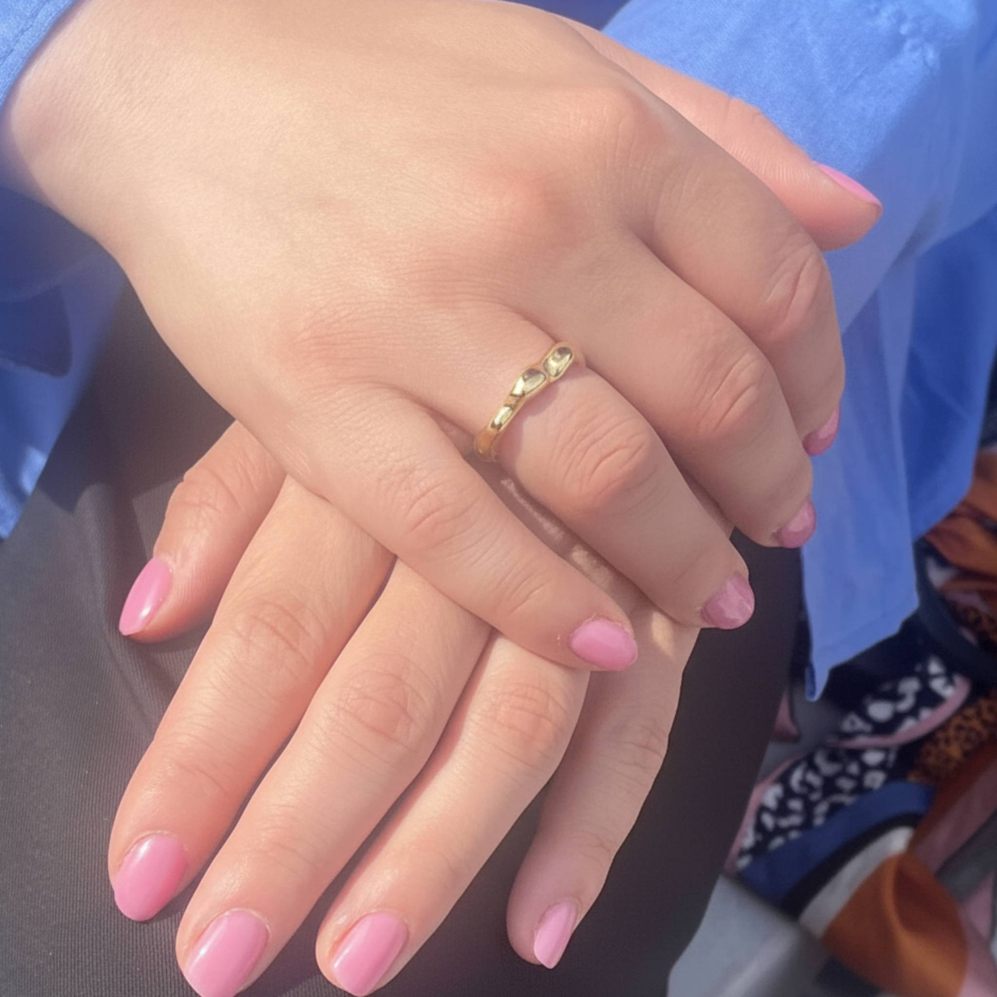 Aimless B gold vermeil ring styled on hand showing bold fluid shape