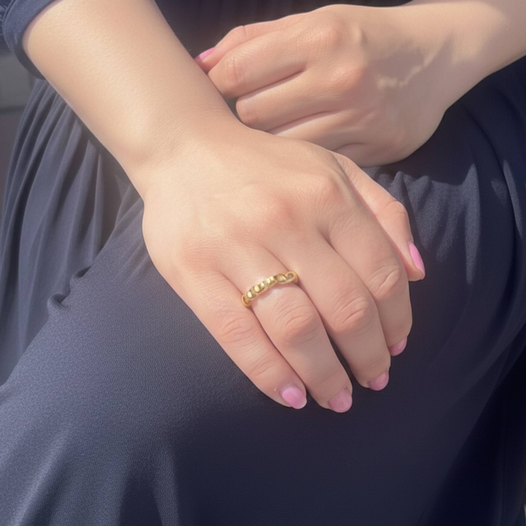 Aimless C gold vermeil ring worn on hand showing fluid textured design