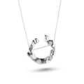 Aimless recycled sterling silver open molten circle pendant necklace close up on white background