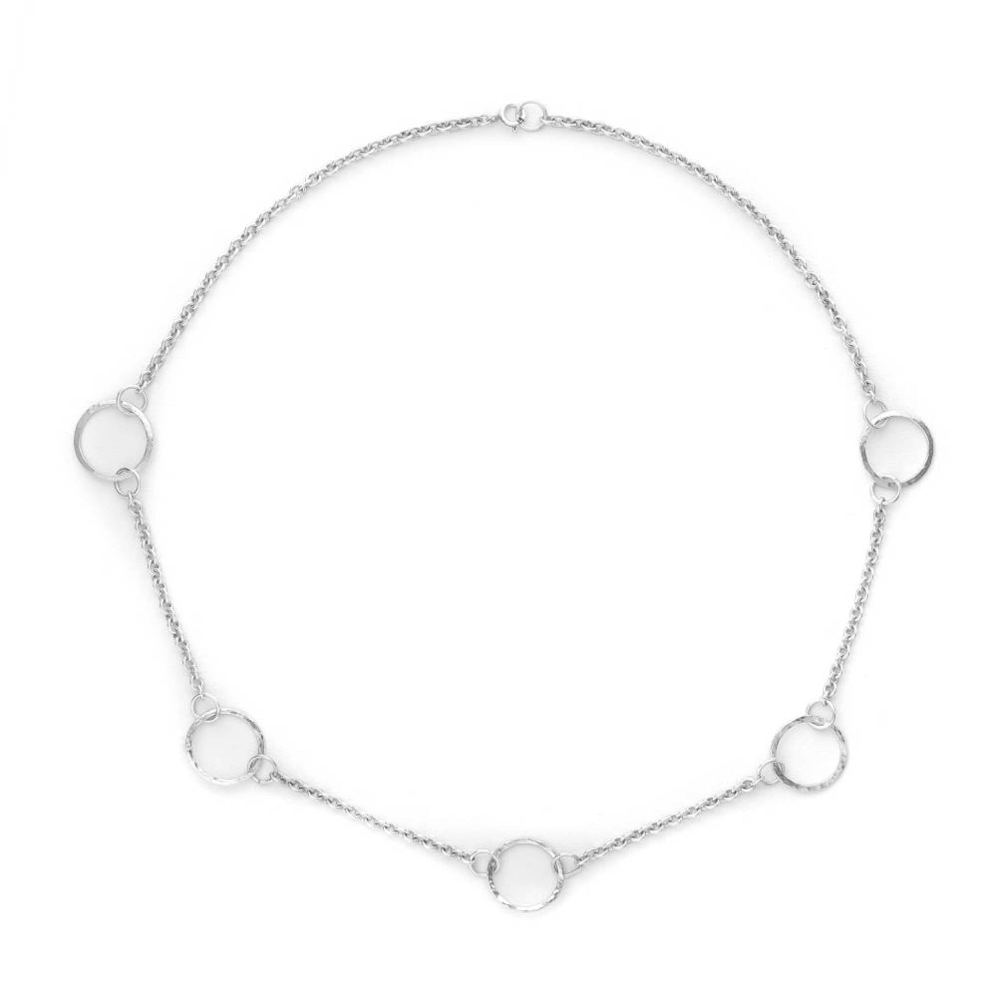 Chain of Hoops recycled sterling silver station chain necklace with linked circular hoops laid flat