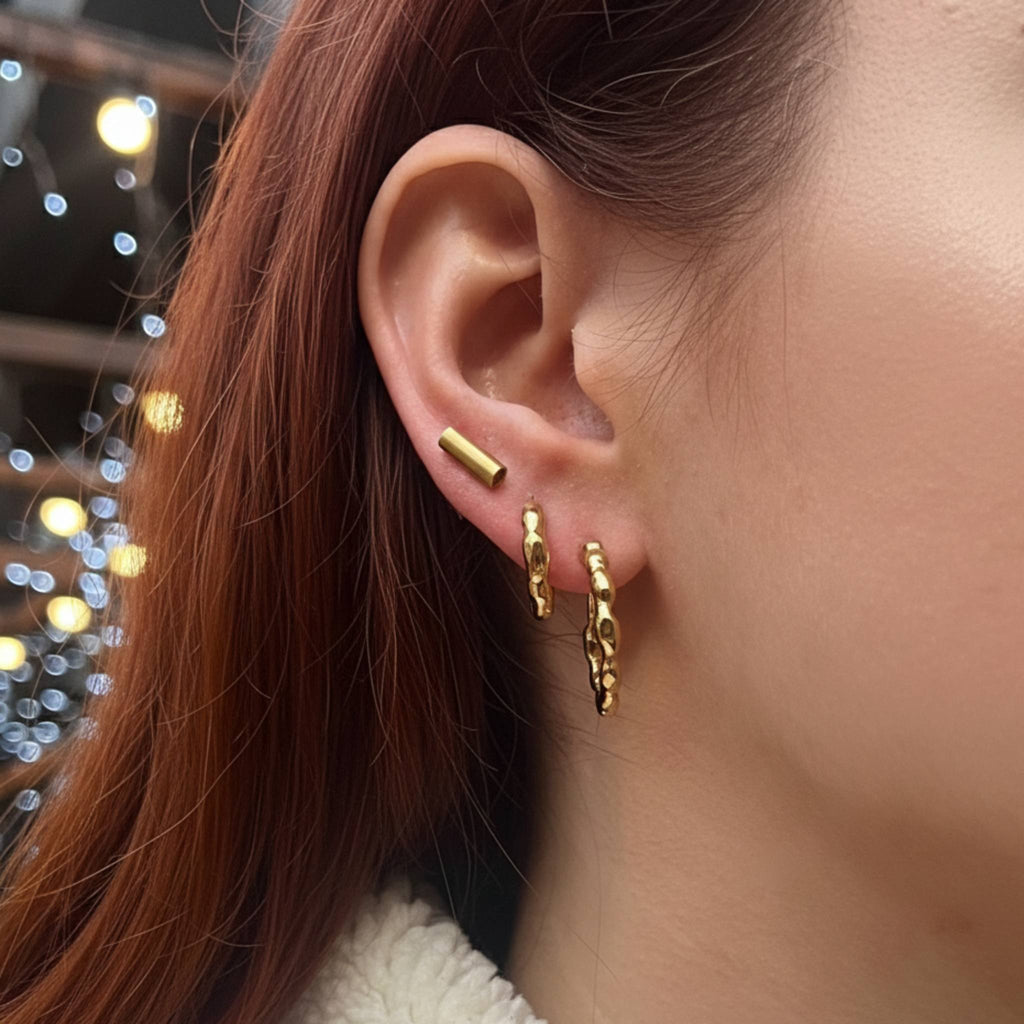 Gold vermeil huggie earrings with sculptural polished form