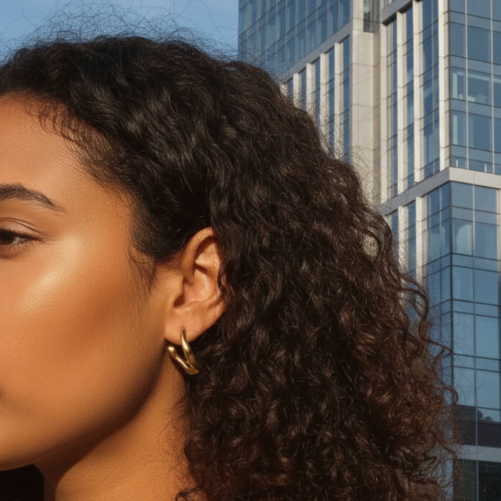 Gold vermeil twisted hoop earrings with high-polish finish