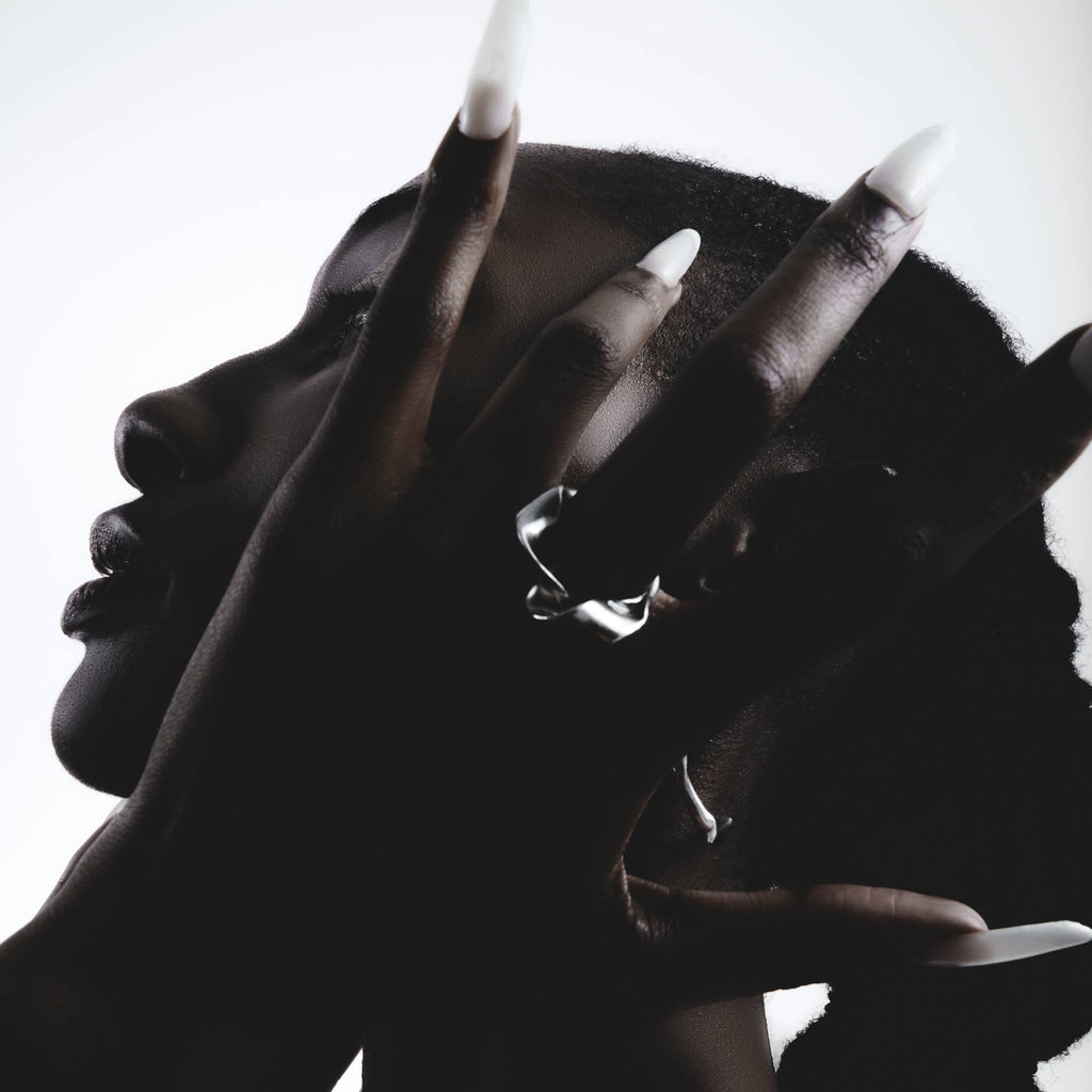 Recycled sterling silver Twisted Ring with sculptural twisted form