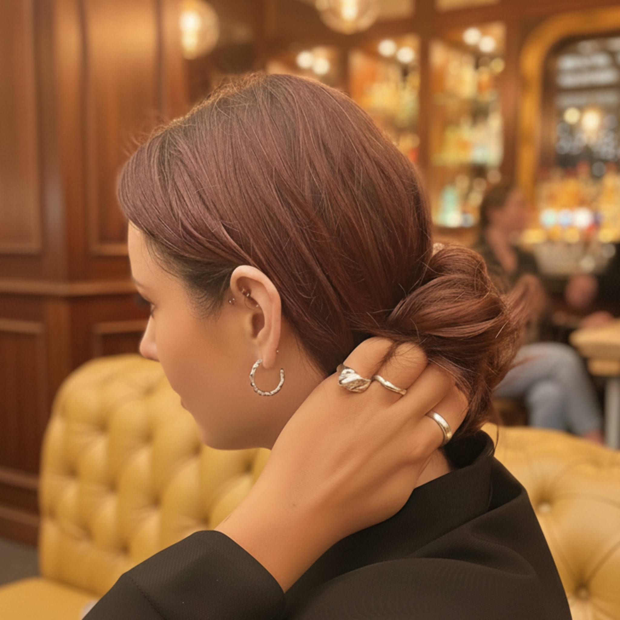 The Recollections sterling silver hoop earrings styled in ear stack on model showing medium scale
