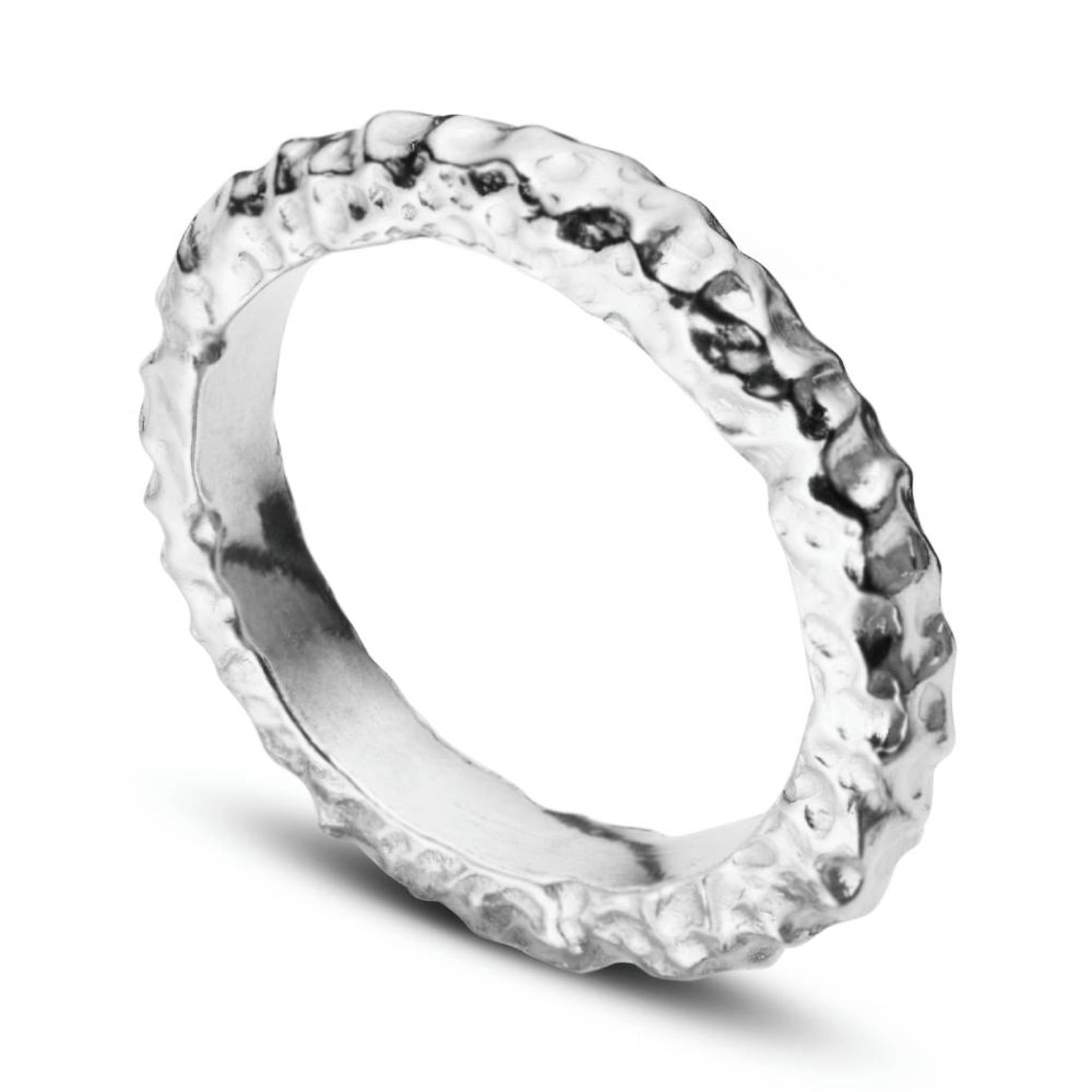 Shy Guy recycled sterling silver ring angled view showing hammered organic detail
