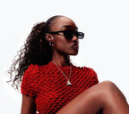 The Hollows sterling silver statement pendant necklace styled on model wearing red top