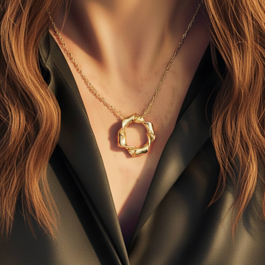 Twisted gold vermeil circle pendant necklace styled on model showing neckline length and drape